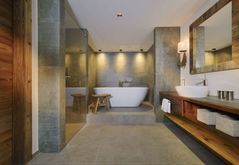 Designer toiletries, hair dryer, bathrobes, slippers