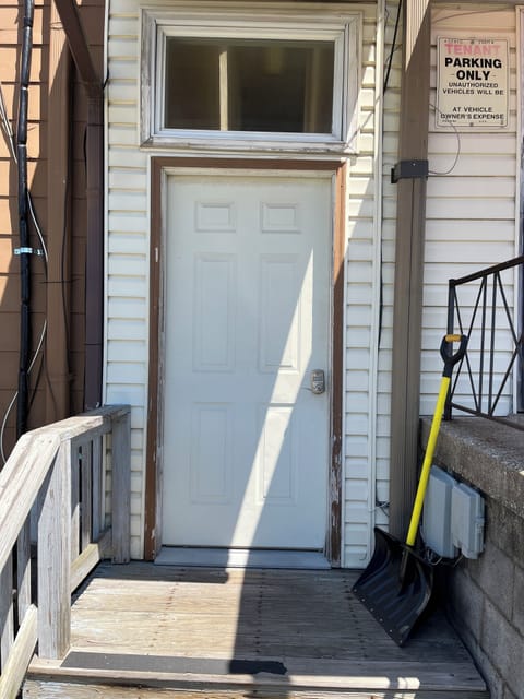 Rear outer door, entrance to the Apartment