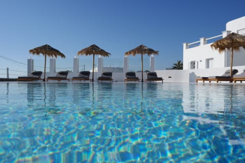Seasonal outdoor pool, open 9 AM to 9 PM, pool umbrellas, sun loungers