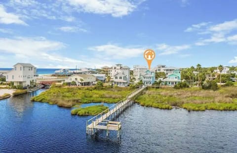 Across the street from beach AND on the lake with private dock!