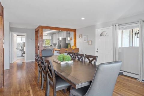 Dinning area on the first floor with lake views and a good size dining table that can easily fit 8 people.
