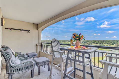 Sip your morning coffee on this private balcony while enjoying panoramic views of rolling countryside stretching to the horizon.