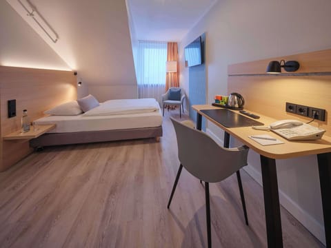 Premium bedding, pillowtop beds, in-room safe, blackout drapes