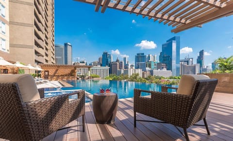 Outdoor pool, pool umbrellas, sun loungers