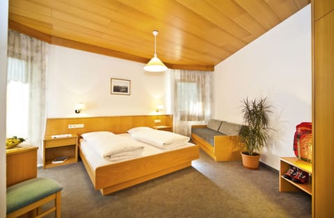 Economy Triple Room, 2 Bedrooms, Balcony (Old Building) | In-room safe, desk, soundproofing, free WiFi