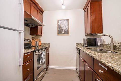 The fully upgraded kitchen comes stocked with everything you need to cook meals during your stay.