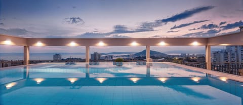 Outdoor pool, pool umbrellas, sun loungers