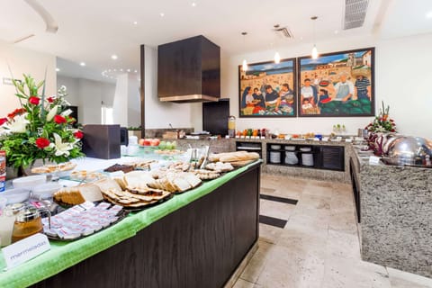 Daily buffet breakfast (USD 10 per person)