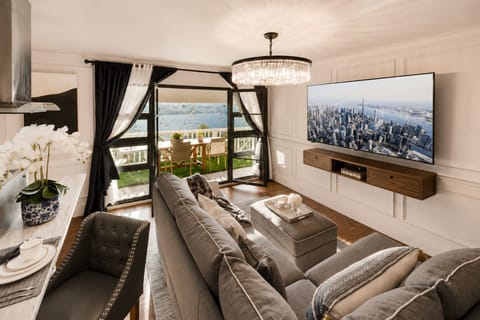 Spacious living room with smart TV. Perfect for a movie night.