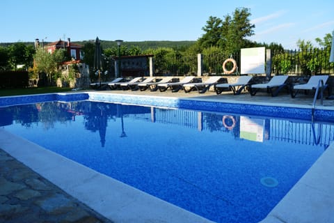 Outdoor pool, sun loungers