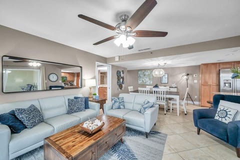 Inviting living space w/ coordinated seating and open sightlines, perfect for relaxing together.