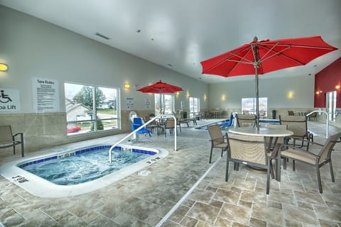 Indoor pool, pool umbrellas, sun loungers