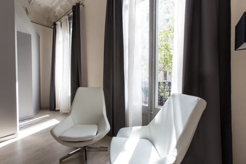 Deluxe Room, Balcony, City View | In-room safe, soundproofing, iron/ironing board, cribs/infant beds
