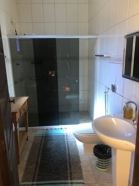 Standard House | Bathroom | Shower, rainfall showerhead, soap, shampoo