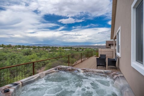 Our 6 person hot tub with views of Sedona and Jerome