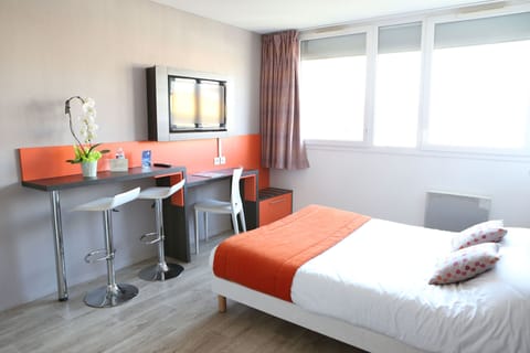 Relax on the comfy bed after a day outside.