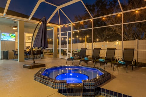 Soak in the heated pool after dark — underwater lighting turns every evening into a resort moment