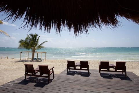 Private beach, white sand, beach towels, scuba diving