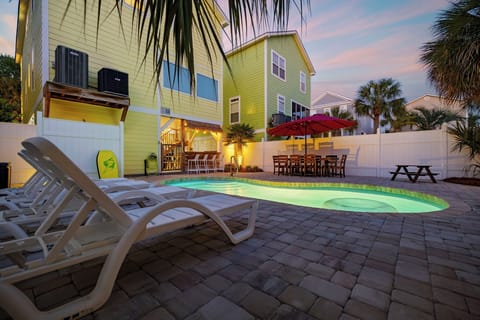 Slip into the heated saltwater pool while the sun drops behind the palms — this is what you came for, and it's waiting the moment you arrive.