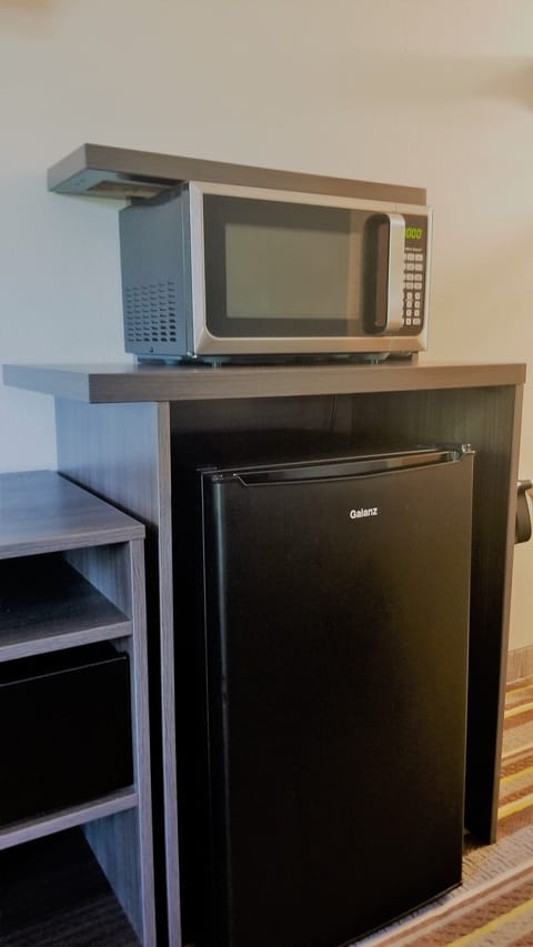 Desk, laptop workspace, blackout drapes, iron/ironing board