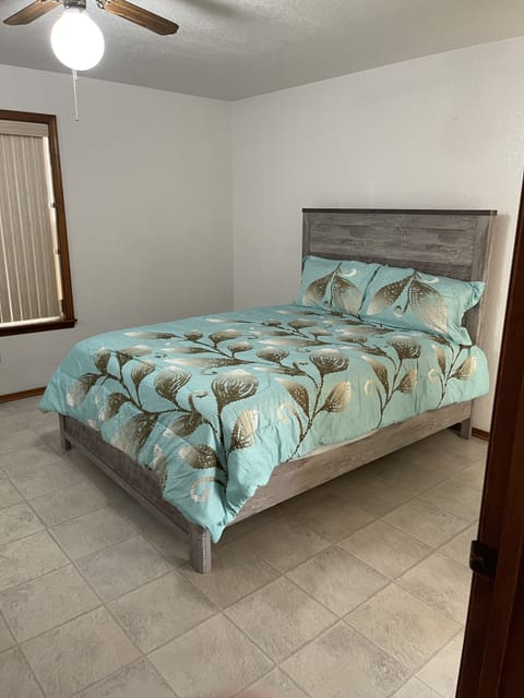 Master Bedroom with on suite and private door to patio