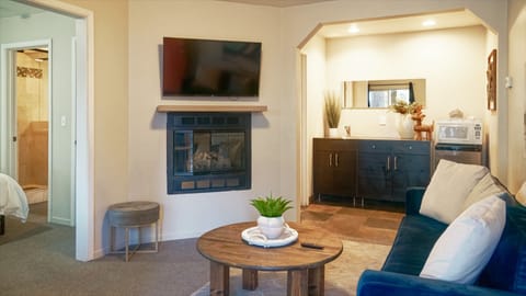 Deluxe Suite | Living room | 50-inch Smart TV with digital channels, TV, Netflix