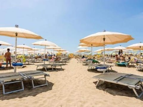 Private beach nearby, sun loungers, beach umbrellas