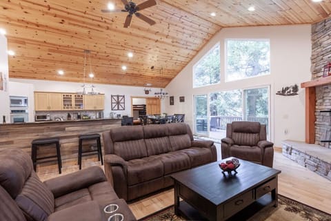 Mountain living at it's best, high ceilings, soaring windows open plan living, and dining. and kitchen