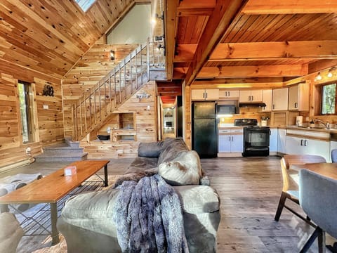 Open 2-story floor plan with giant windows and boasting light. 