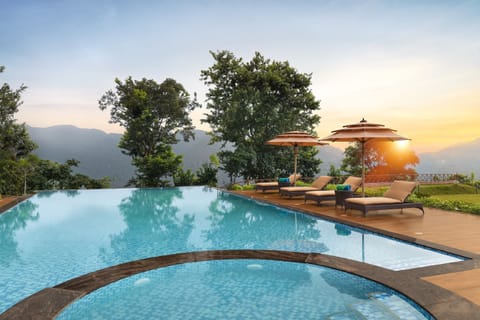 Outdoor pool, open 8:00 AM to 6:00 PM, pool umbrellas, sun loungers
