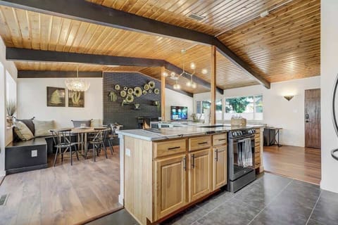 The open layout between the living room, kitchen, and dining room is perfect for large groups traveling together to enjoy each other's company.