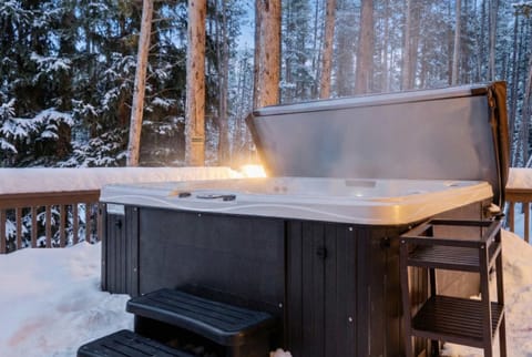 After a day out on the slopes or hiking trails ease sore muscles in the private 8-person hot tub.