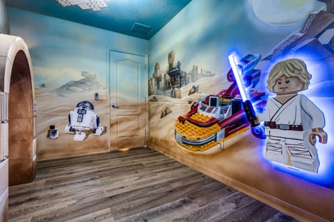 The icon himself with his lightsaber blazing. See the murals' hidden treasures!