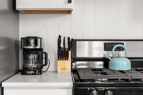 Newly renovLiving room with couch (not a sleeper sofa) and smart Roku TV to enjoy your streaming services and basic cable.ated kitchen, fully stocked with cookware and, all new appliances