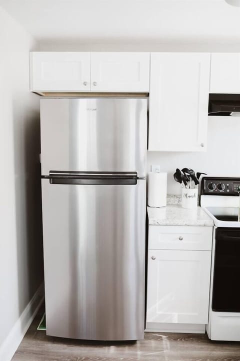 New, full size stainless steel refrigerator