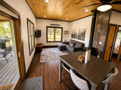 Living room & dining table over looking the lake.