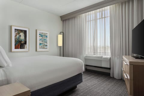 Premium bedding, down comforters, desk, blackout drapes