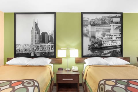 Desk, blackout drapes, iron/ironing board, free cribs/infant beds