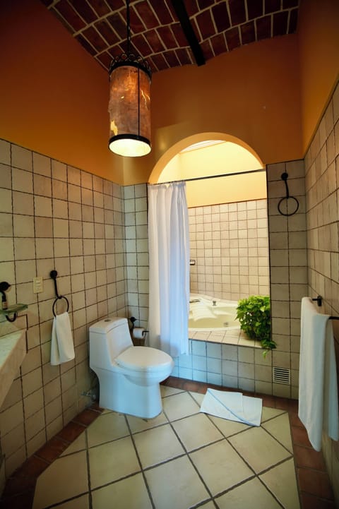 Deluxe Villa, 1 Bedroom, Hot Tub, Lagoon View | Bathroom | Shower, free toiletries, towels