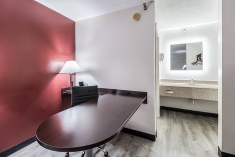 Desk, blackout drapes, cribs (free), WiFi (free)