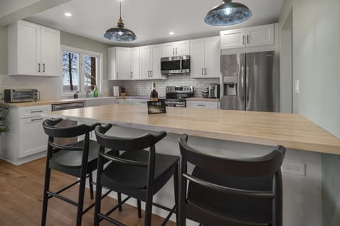 The spacious island provides space to gather and share memories while making a home away from home cooked meal.