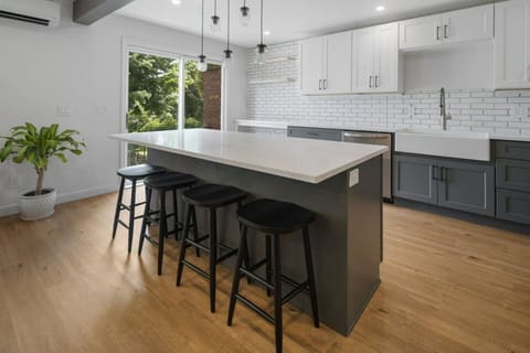 The galley style kitchen offers state of the art appliances and every amenity you will need to cook a unforgettable meal.