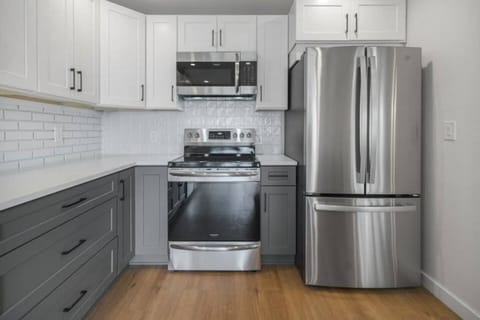 The galley style kitchen offers state of the art appliances and every amenity you will need to cook a unforgettable meal.