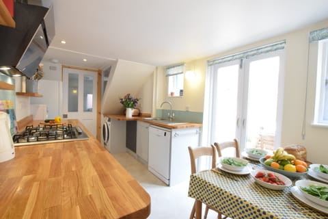 Fridge, dishwasher, cookware/dishes/utensils