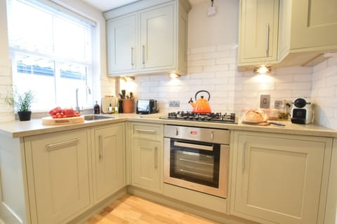 Fridge, dishwasher, cookware/dishes/utensils