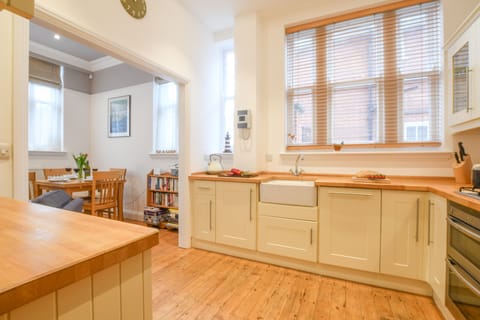Fridge, dishwasher, cookware/dishes/utensils