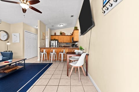 View of the living room when entering the front door. Opens up to the open concept kitchen with bar space!