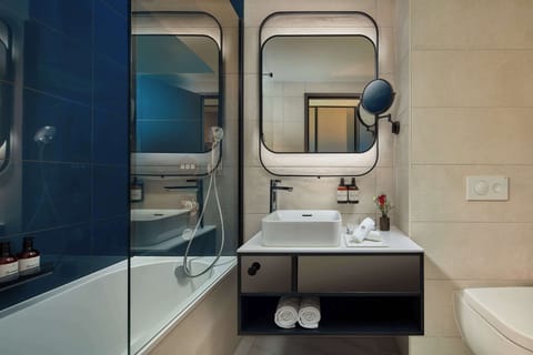 Eco-friendly toiletries, hair dryer, bathrobes, towels