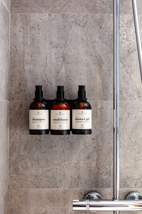 Eco-friendly toiletries, hair dryer, bathrobes, towels