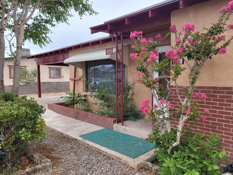 Front view of house and front porch.